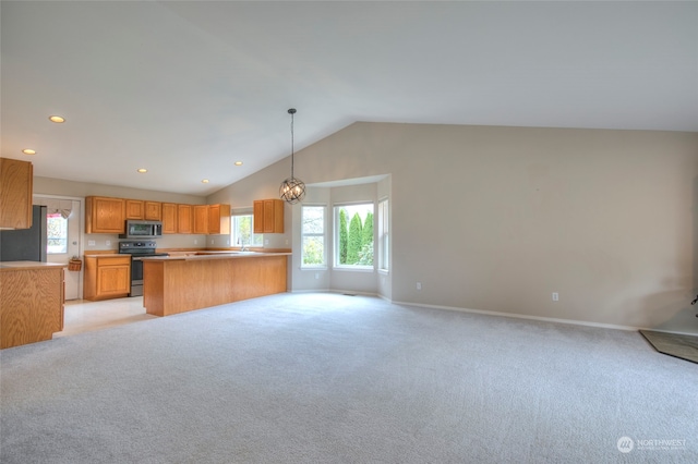 kitchen with kitchen peninsula, stainless steel appliances, light colored carpet, hanging light fixtures, and lofted ceiling