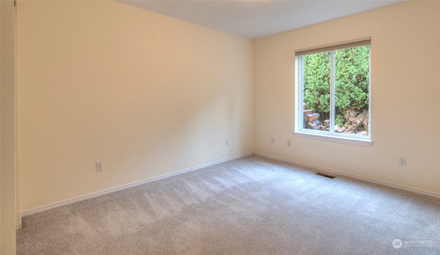 view of carpeted spare room