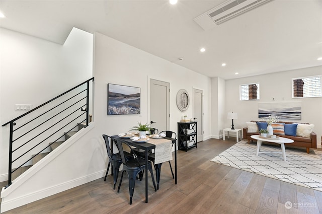 dining room featuring dark wood-type flooring