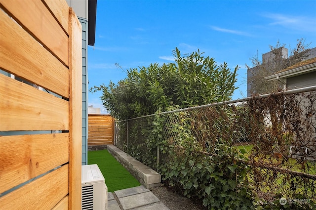 view of yard featuring ac unit