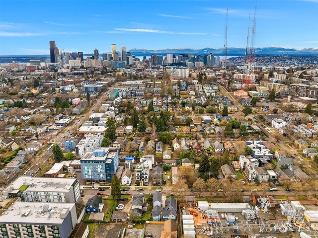 birds eye view of property featuring a mountain view