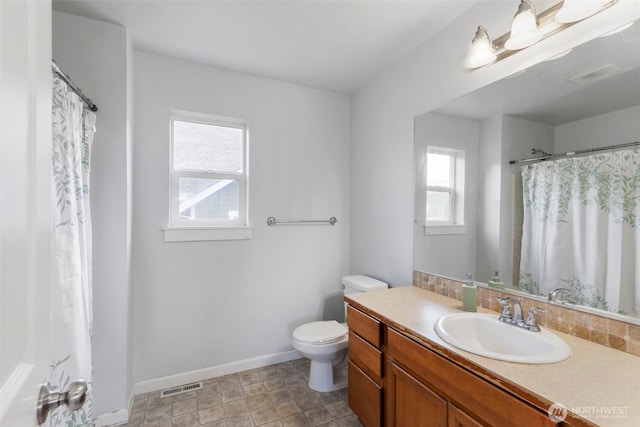 6398 Juanita Cir NE, Bremerton, WA 98311 - full bath with visible vents, toilet, vanity, and baseboards
