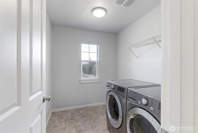 6398 Juanita Cir NE, Bremerton, WA 98311 - laundry room with visible vents, baseboards, separate washer and dryer, and laundry area