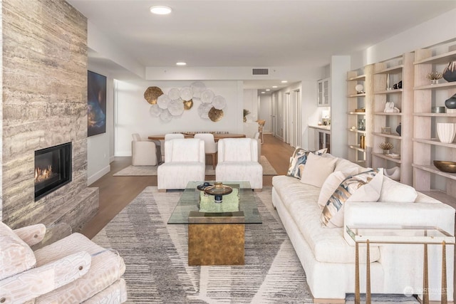 1250 Alki Ave SW Phg, Phg, Seattle, WA 98116 - living area with a fireplace, wood finished floors, and recessed lighting