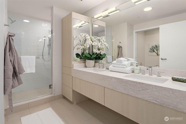 1250 Alki Ave SW Phg, Phg, Seattle, WA 98116 - bathroom featuring double vanity, a shower stall, recessed lighting, and tile patterned floors