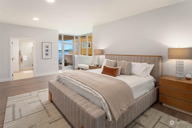 1250 Alki Ave SW Phg, Phg, Seattle, WA 98116 - bedroom with wood finished floors, baseboards, recessed lighting, and connected bathroom