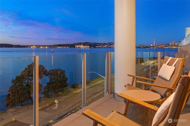 1250 Alki Ave SW Phg, Phg, Seattle, WA 98116 - balcony at dusk featuring a water view
