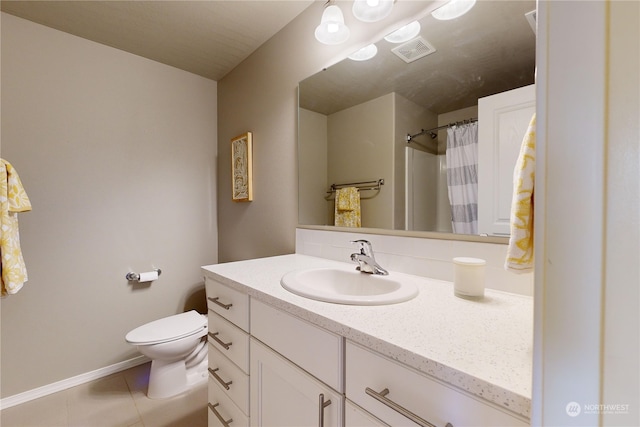 bathroom with tile patterned flooring, vanity, toilet, and curtained shower