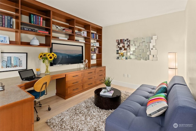 1521 2nd Ave Unit 904, Seattle, WA 98101 - home office with built in desk and light wood finished floors