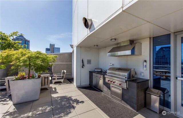 1521 2nd Ave Unit 904, Seattle, WA 98101 - view of patio featuring area for grilling and a sink