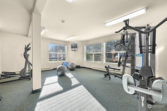 exercise room featuring baseboard heating