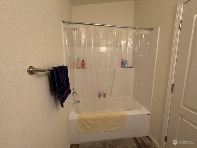 bathroom featuring shower / bath combination with curtain and wood-type flooring