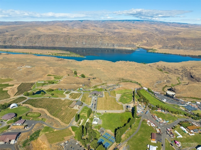 drone / aerial view featuring a rural view and a water view