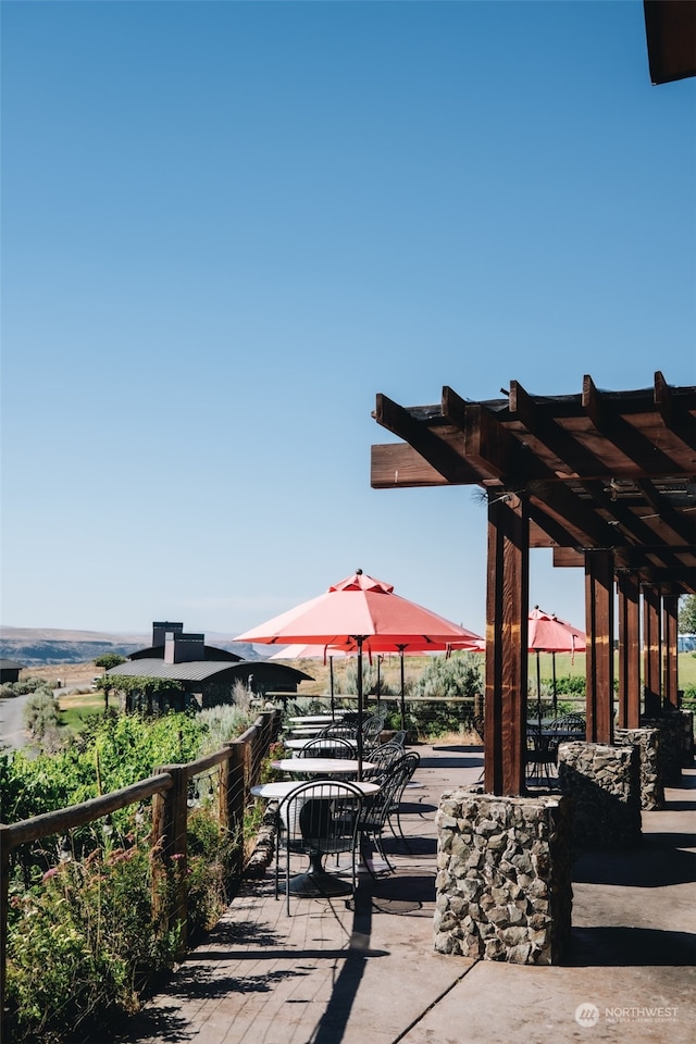 view of property's community featuring a pergola