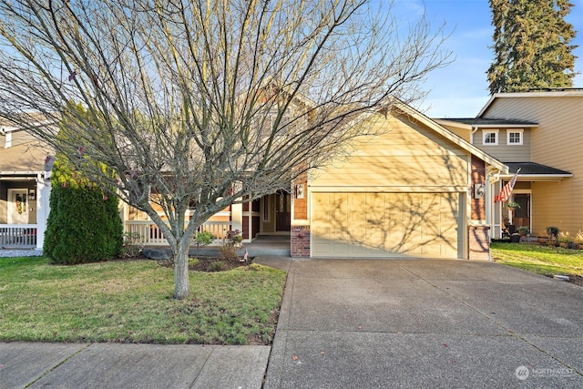 view of front of house with a garage and a front lawn