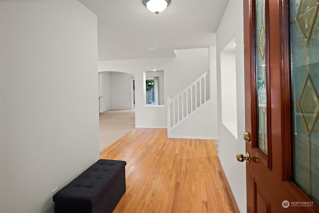 entrance foyer with light hardwood / wood-style flooring