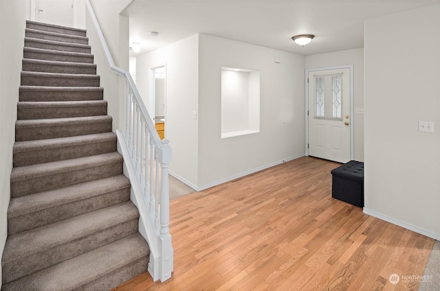 entrance foyer featuring hardwood / wood-style flooring