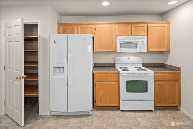 kitchen featuring white appliances