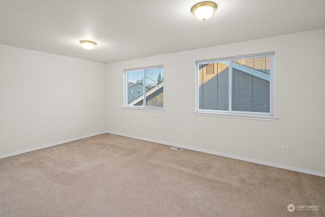 view of carpeted spare room