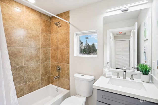 full bathroom featuring shower / bathtub combination with curtain, vanity, and toilet