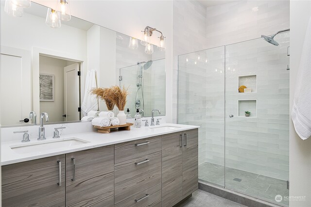 bathroom with vanity and walk in shower