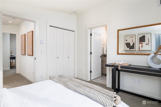 carpeted bedroom with a closet