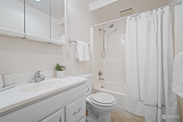 full bathroom featuring tile patterned flooring, vanity, toilet, and shower / bathtub combination with curtain