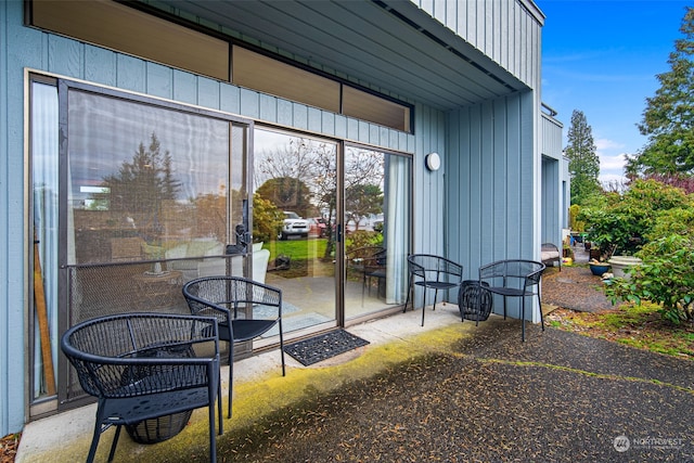 doorway to property with a patio