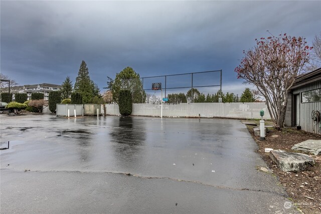 view of community featuring basketball court