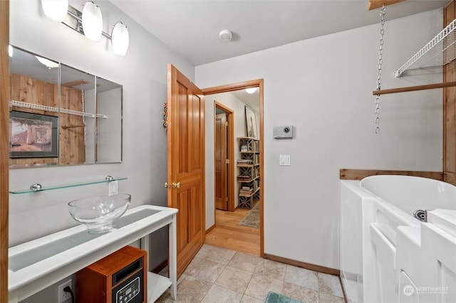 bathroom with a washtub