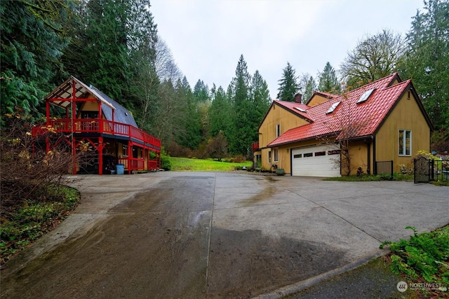 view of home's exterior with a deck