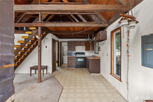 kitchen featuring black electric range oven, stainless steel microwave, wooden ceiling, electric panel, and vaulted ceiling with beams