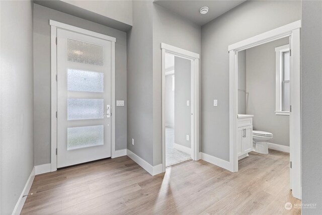 foyer entrance featuring light hardwood / wood-style floors