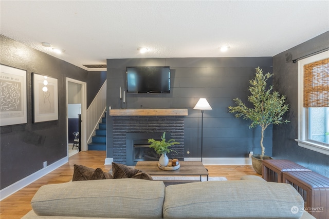 living room with light hardwood / wood-style floors