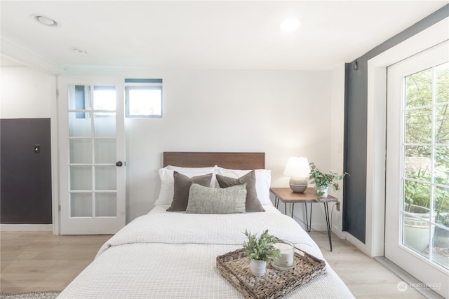 bedroom with light hardwood / wood-style flooring