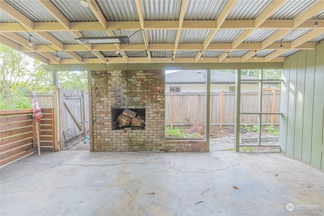 exterior space with an outdoor brick fireplace