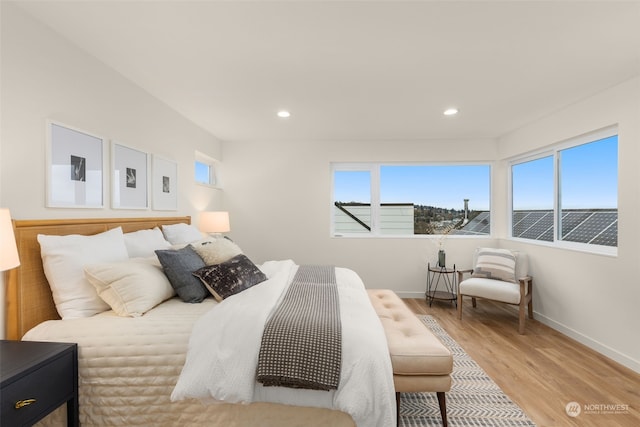 bedroom with light hardwood / wood-style flooring