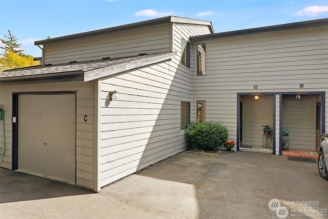 exterior space featuring a garage