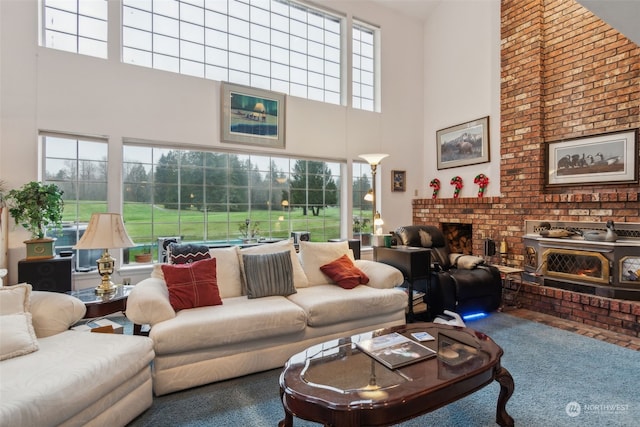 living room featuring carpet flooring and a towering ceiling