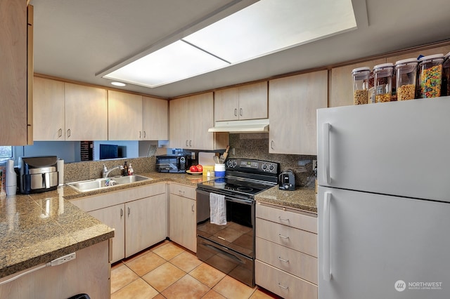 kitchen with sink, black electric range, white refrigerator, light brown cabinetry, and light tile patterned floors