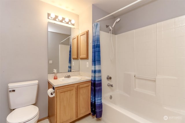 full bathroom featuring vanity, toilet, and shower / tub combo