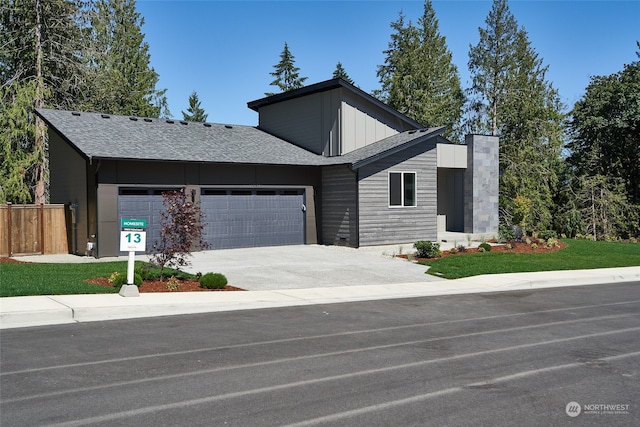 view of front of property featuring a garage