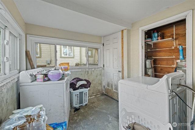 laundry room with washer and dryer