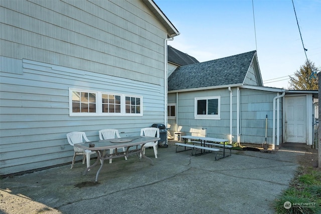 view of patio featuring a grill