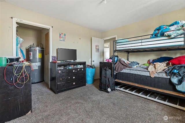 carpeted bedroom featuring electric water heater