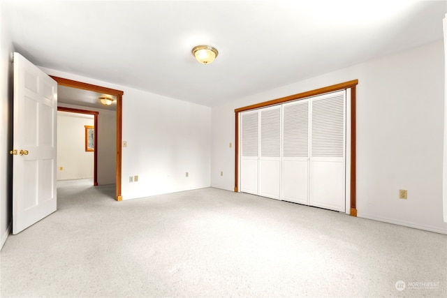 unfurnished bedroom with a closet