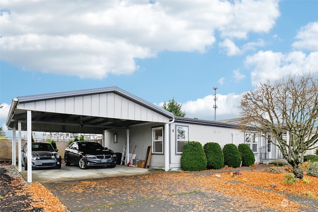 view of front of home featuring a carport