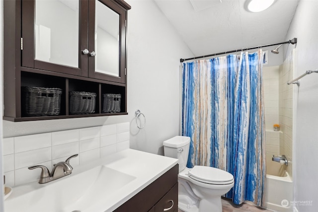 full bathroom featuring toilet, decorative backsplash, vanity, shower / tub combo, and hardwood / wood-style flooring