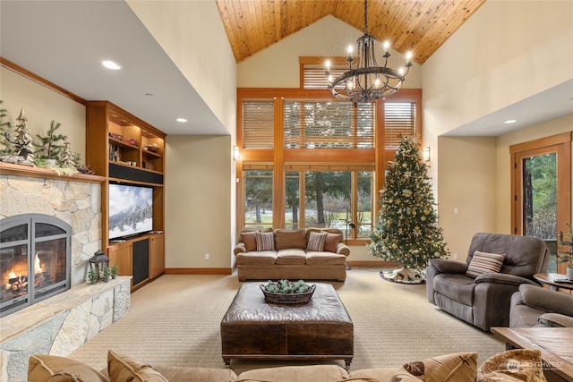 living room featuring light carpet, high vaulted ceiling, an inviting chandelier, a fireplace, and wood ceiling