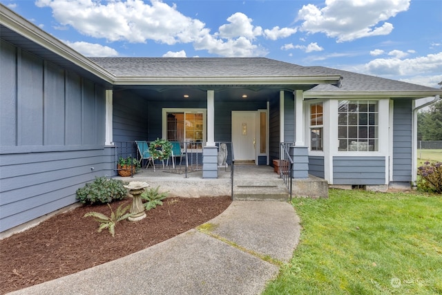 entrance to property with a porch